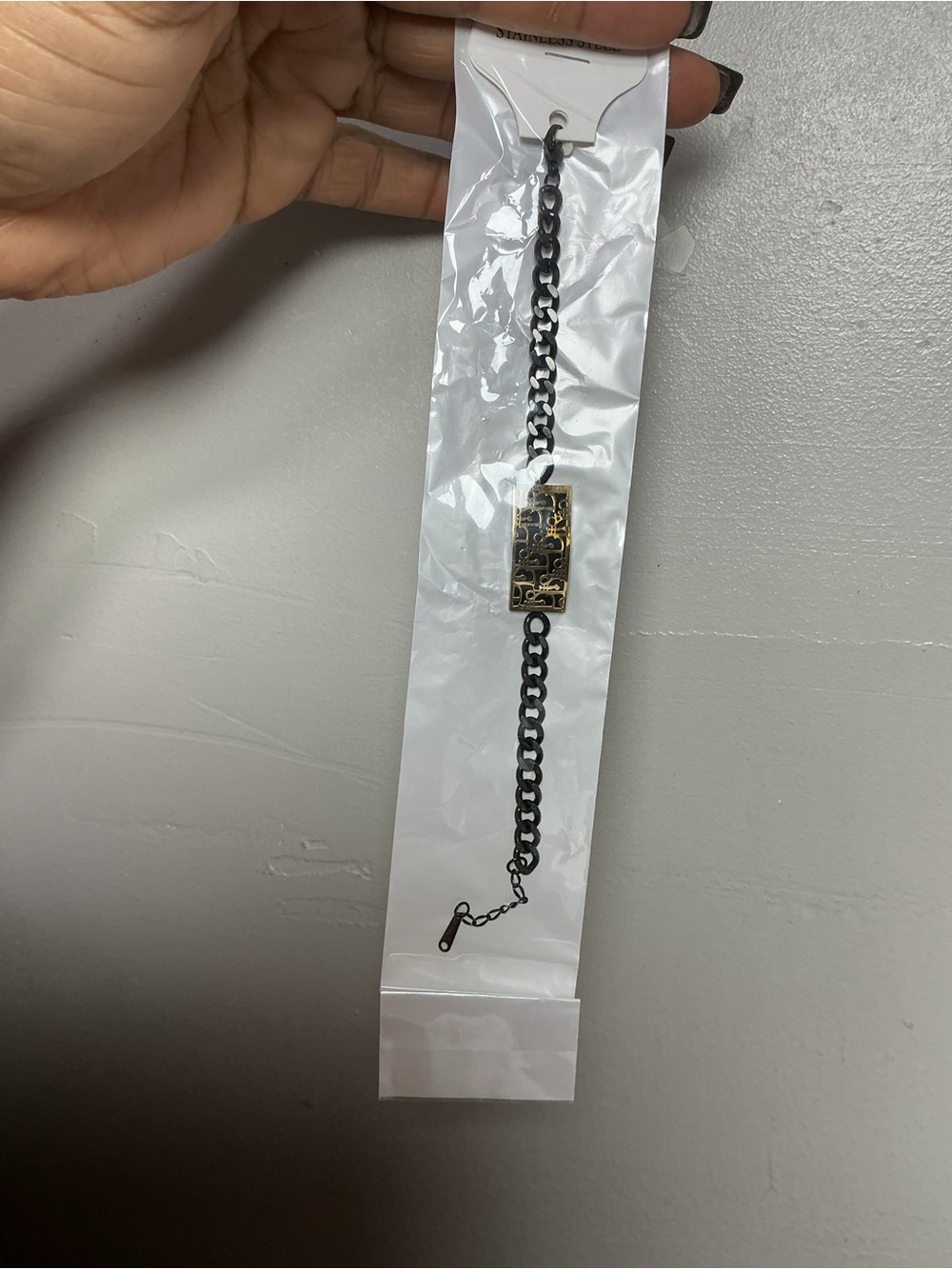 Black and Gold Chain-Link Bracelet with Decorative Plate